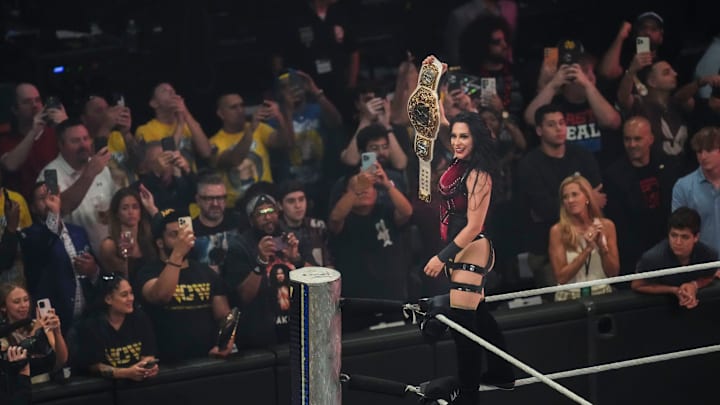 Stephanie Vaquer celebrates winning the Women’s World Championship on Saturday, Sept. 20, 2025, during WWE WrestlePalooza at Gainbridge Fieldhouse in Indianapolis. Vaquer is one of the top chases in Topps Chrome WWE 2026.