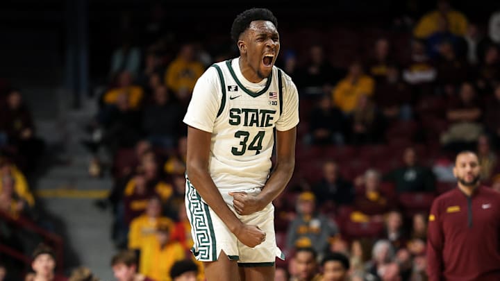 Dec 4, 2024; Minneapolis, Minnesota, USA; Michigan State Spartans forward Xavier Booker (34) celebrates his three-point basket against the Minnesota Golden Gophers during the second half at Williams Arena. Mandatory Credit: Matt Krohn-Imagn Images