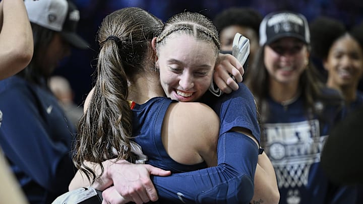 UConn Huskies guard Paige Bueckers (5) celebrates with guard Nika Muhl (10) after beating the USC Trojans in the finals of the Portland Regional of the NCAA Tournament.