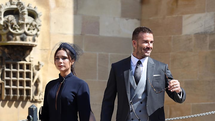 Victoria Beckham and David Backham arrive for the royal wedding at George's Chapel at Windsor Castle. Victoria Beckham and David Backham arrive for the royal wedding at George's Chapel at Windsor Castle.