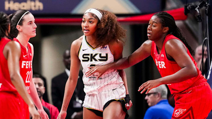 Chicago Sky forward Angel Reese (5) reacts to a flagrant foul from Indiana Fever guard Caitlin Clark (22) on Saturday, May 17, 2025, during a game between the Indiana Fever and the Chicago Sky at Gainbridge Fieldhouse in Indianapolis. The Indiana Fever defeated the Chicago Sky, 93-58.