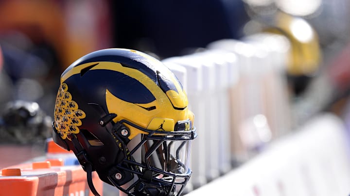 Oct 12, 2019; Champaign, IL, USA; A Michigan Wolverines helmet sits on the back of the bench during the second half of the game against the Illinois Fighting Illini at Memorial Stadium. Mandatory Credit: Michael Allio-Imagn Images