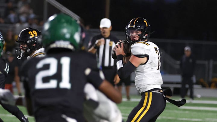 Newbury Park quarterback Brady Smigiel looks for a receiver during the second quarter of a nonleague game at Pacifica High on Friday, Sept. 5, 2025. Pacifica won 56-35.