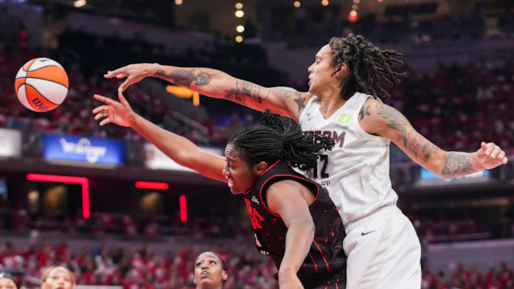 Indiana Fever forward Aliyah Boston (7) and Atlanta Dream center Brittney Griner (42) go for the ball Tuesday, Sept. 16, 2025, during Game 2 of a WNBA playoff matchup between the Indiana Fever and the Atlanta Dream at Gainbridge Fieldhouse in Indianapolis. The Indiana Fever defeated the Atlanta Dream, 77-60.