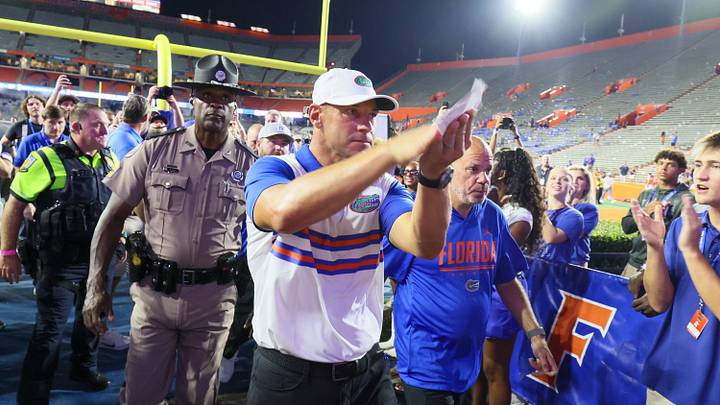 Florida head coach Jon Sumrall gator chomps to the fans as he leaves the field after the second half an NCAA football game at Steve Spurrier Field at Ben Hill Griffin Stadium in Gainesville, FL on Saturday, September 5, 2026. Gators won 66-21. [Alan Youngblood/Gainesville Sun]