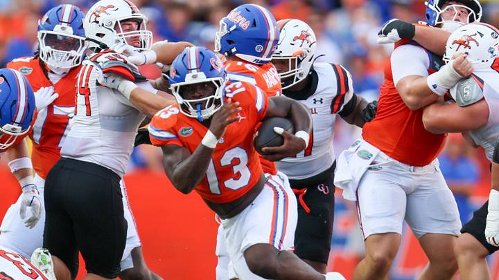 Florida running back Jadan Baugh (13) runs against Campbell during the first half of an NCAA football game at Steve Spurrier Field at Ben Hill Griffin Stadium in Gainesville, FL on Saturday, September 12, 2026. [Alan Youngblood/Gainesville Sun]