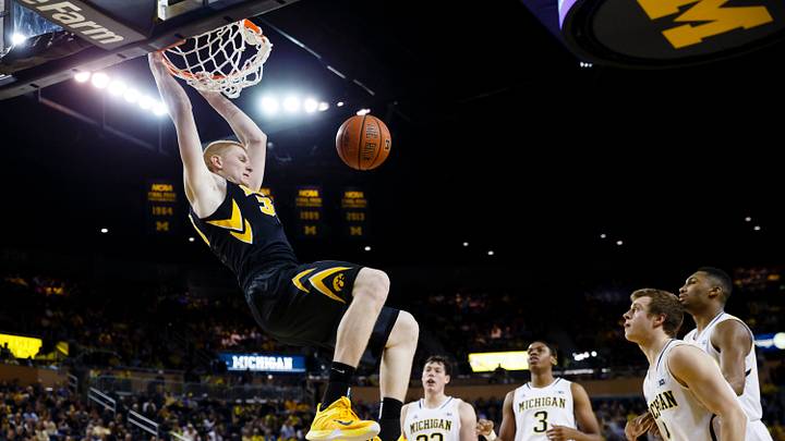 Feb 5, 2015; Ann Arbor, MI, USA; Iowa Hawkeyes forward Aaron White (30) dunks in the second half against the Michigan Wolverines at Crisler Center. Iowa won 72-54. Mandatory Credit: Rick Osentoski-USA TODAY Sports