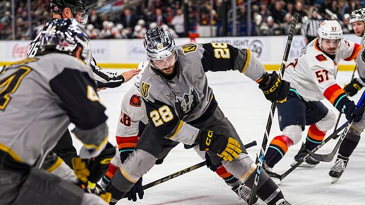 Henderson Silver Knights forward Tanner Laczynski wins a face off against Coachella Valley Firebirds center Logan Morrison during the first period of their game at Acrisure Arena in Palm Desert, Calif., Wednesday, Jan. 7, 2026.