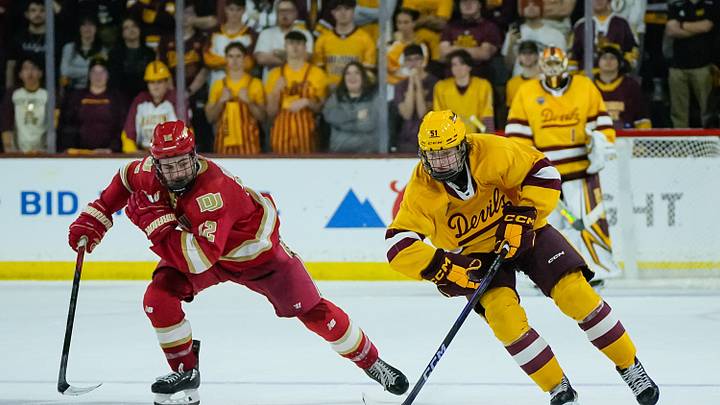 Sam Harris (12) of the Denver Pioneers follows Cruz Lucius (51) of the Arizona State Sun Devils down the ice as they play 3-on-3 in overtime at Mullett Arena on Feb. 8, 2025, in Tempe, Ariz. Sam Harris (12) of the Denver Pioneers follows Cruz Lucius (51) of the Arizona State Sun Devils down the ice as they play 3-on-3 in overtime at Mullett Arena on Feb. 8, 2025, in Tempe, Ariz.