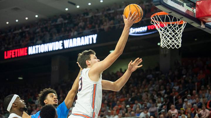 Former Auburn center Walker Kessler signed a four-year, $130 million deal with the Los Angeles Lakers after being traded.