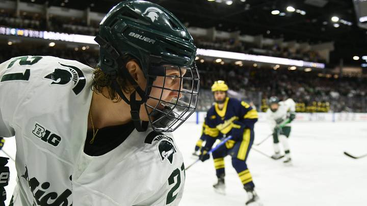 MSU's Red Savage moves the puck against Michigan en route to Spartan's Big Ten Championship over the Wolverines in a sudden death overtime thriller, Saturday, March 23, 2024, during the Big Ten hockey championship at Munn Ice Arena in East Lansing. MSU's Red Savage moves the puck against Michigan en route to Spartan's Big Ten Championship over the Wolverines in a sudden death overtime thriller, Saturday, March 23, 2024, during the Big Ten hockey championship at Munn Ice Arena in East Lansing.