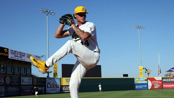 Rockies prospect Brody Brecht, while pitching for Iowa