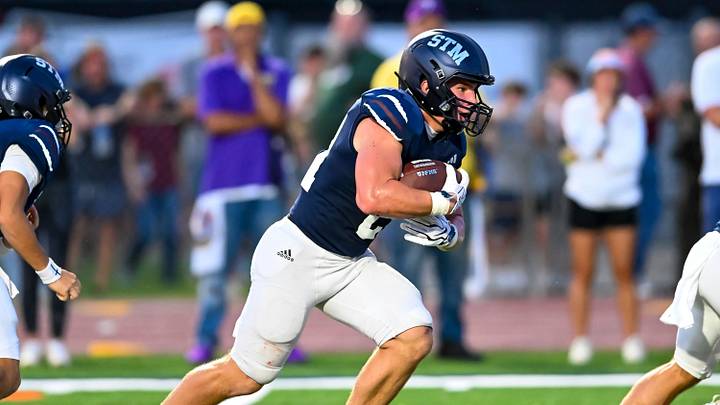 Landyn Craft carries the football for St. Thomas More against Teurlings Catholic Landyn Craft carries the football for St. Thomas More against Teurlings Catholic