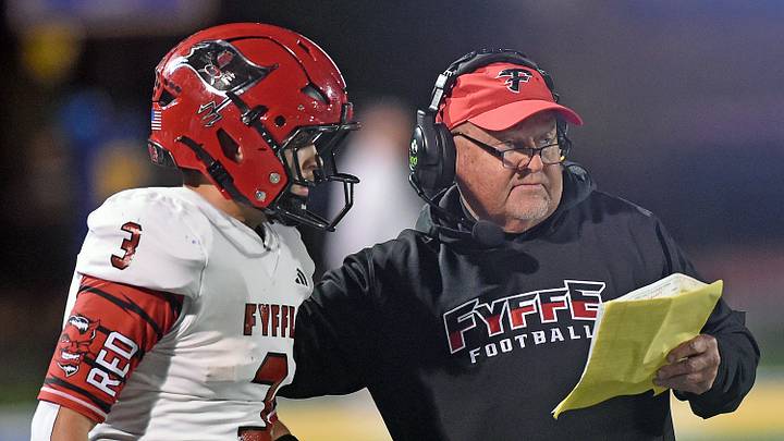 Fyffe quarterback Maddox Doss talks with Coach Paul Benefield during high school football action in Piedmont, Alabama November 14, 2025. (Dave Hyatt / Hyatt Media LLC) Fyffe quarterback Maddox Doss talks with Coach Paul Benefield during high school football action in Piedmont, Alabama November 14, 2025. (Dave Hyatt / Hyatt Media LLC)