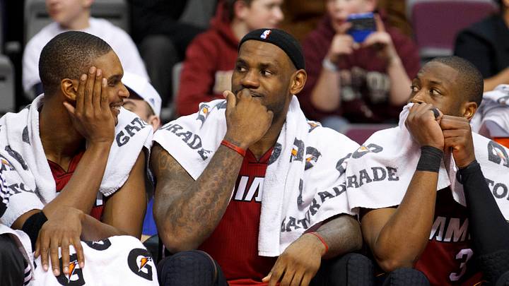 Feb 11, 2011; Auburn Hills, MI, USA; Miami Heat power forward Chris Bosh (left), small forward LeBron James (center), and shooting guard Dwyane Wade (3) sit on the bench in the fourth quarter of an NBA game at The Palace. Miami defeated Detroit 106-92. Mandatory Credit: Rick Osentoski-USA TODAY Sports Feb 11, 2011; Auburn Hills, MI, USA; Miami Heat power forward Chris Bosh (left), small forward LeBron James (center), and shooting guard Dwyane Wade (3) sit on the bench in the fourth quarter of an NBA game at The Palace. Miami defeated Detroit 106-92. Mandatory Credit: Rick Osentoski-USA TODAY Sports