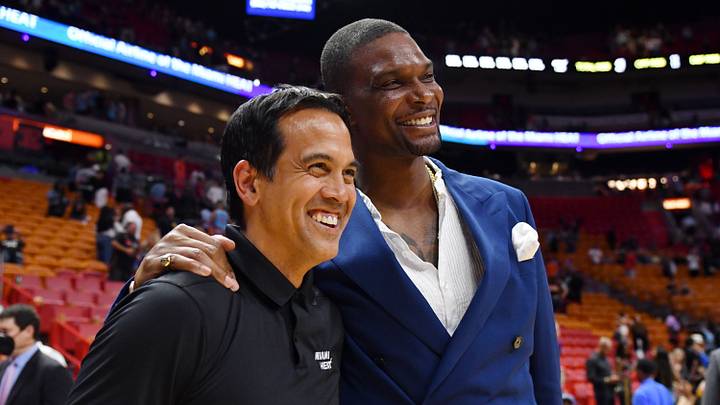Mar 18, 2022; Miami, Florida, USA; Miami Heat head coach Erik Spoelstra greets former player Chris Bosh following the game against Oklahoma City at FTX Arena. Mandatory Credit: Jim Rassol-USA TODAY Sports Mar 18, 2022; Miami, Florida, USA; Miami Heat head coach Erik Spoelstra greets former player Chris Bosh following the game against Oklahoma City at FTX Arena. Mandatory Credit: Jim Rassol-USA TODAY Sports