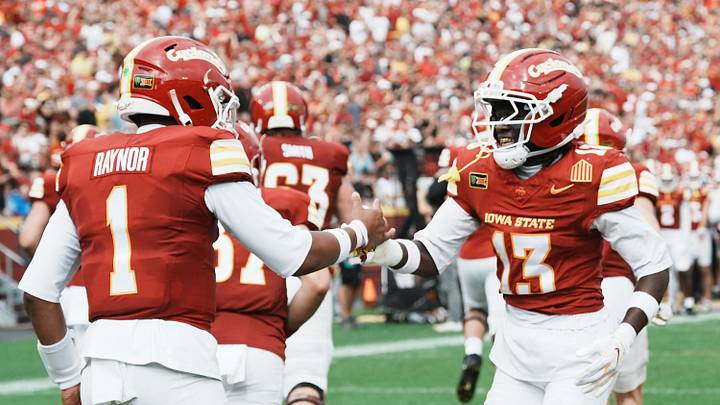 Iowa State wide receiver Jamal Polite Jr. (13) celebrates with quarterback Jaylen Raynor (1) after scoring a touchdown against Bowling Green during the first quarter on Sept. 19, 2026, at Jack Trice Stadium in Ames, Iowa. Iowa State wide receiver Jamal Polite Jr. (13) celebrates with quarterback Jaylen Raynor (1) after scoring a touchdown against Bowling Green during the first quarter on Sept. 19, 2026, at Jack Trice Stadium in Ames, Iowa.