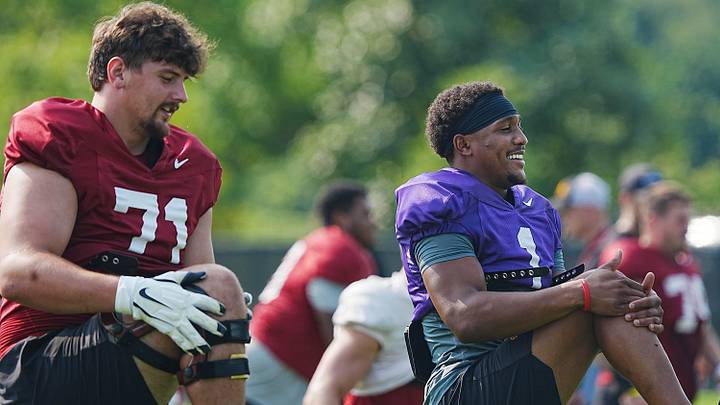 Iowa State quarterback Jaylen Raynor (1) and offensive lineman Gabriel Greenlee (71) warm up during the university’s football open practice at Johnny Majors practice field on August 8, 2026, in Ames, Iowa. Iowa State quarterback Jaylen Raynor (1) and offensive lineman Gabriel Greenlee (71) warm up during the university’s football open practice at Johnny Majors practice field on August 8, 2026, in Ames, Iowa.