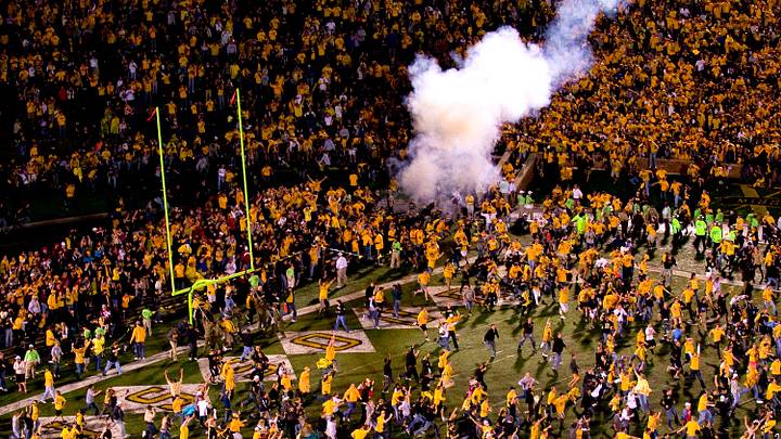 Oct 23, 2010; Columbia, MO, USA; Missouri Tigers players and fans celebrate their win over the Oklahoma Sooners at Faurot Field at Memorial Stadium. The Tigers defeated the Sooners 36-27. Mandatory Credit: Photo by Scott Rovak-USA TODAY Sports Oct 23, 2010; Columbia, MO, USA; Missouri Tigers players and fans celebrate their win over the Oklahoma Sooners at Faurot Field at Memorial Stadium. The Tigers defeated the Sooners 36-27. Mandatory Credit: Photo by Scott Rovak-USA TODAY Sports