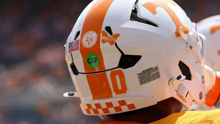 Sep 5, 2026; Knoxville, Tennessee, USA;  A butterfly sticker in honor of Dolly Parton is on the helmet of Tennessee Volunteers linebacker Amare Campbell (0) before the game against the Furman Paladins at Neyland Stadium.  Mandatory Credit: Randy Sartin-Imagn Images