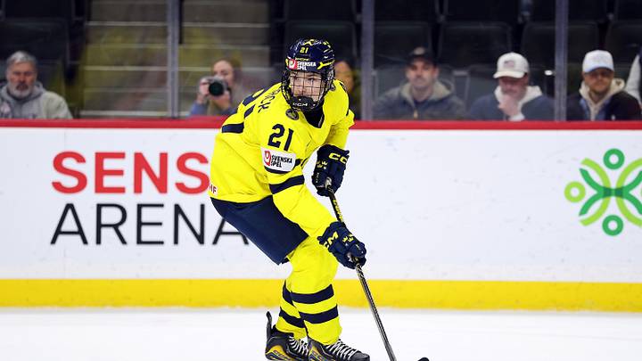 ST PAUL, MINNESOTA - JANUARY 02: Viggo Bjorck #21 of Sweden skates with the puck against Latvia in the third period of a quarterfinal game during the IIHF World Junior Hockey Championship at Grand Casino Arena on January 02, 2026 in St Paul, Minnesota. Sweden defeated Latvia 6-3. (Photo by David Berding/Getty Images)