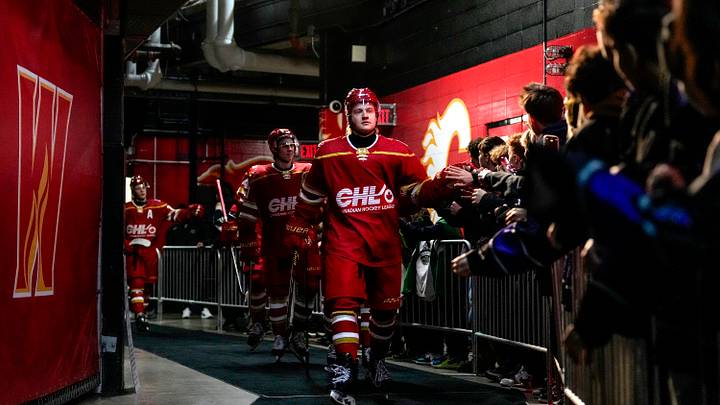CALGARY, CANADA - NOVEMBER 25: Egor Shilov #9 of Team CHL and teammates great fans as they walk to the ice during warmups before the CHL USA Prospects Challenge at the Scotiabank Saddledome on November 25, 2025 in Calgary, Canada. (Photo by Leah Hennel/Getty Images)