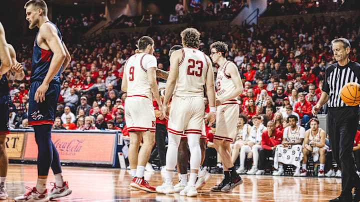 Nebraska men's basketball players huddle during their game against Saint Mary's at the Sanford Pentagon in Sioux Falls, South Dakota.