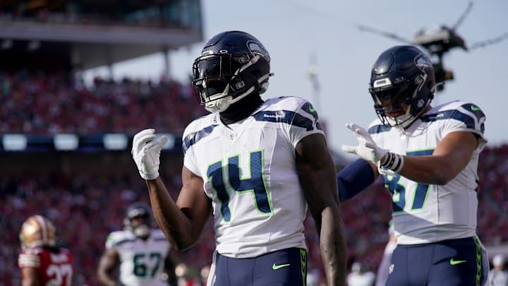 Dec 10, 2023; Santa Clara, California, USA; Seattle Seahawks wide receiver DK Metcalf (14) reacts after catching a touchdown against the San Francisco 49ers in the first quarter at Levi's Stadium. Dec 10, 2023; Santa Clara, California, USA; Seattle Seahawks wide receiver DK Metcalf (14) reacts after catching a touchdown against the San Francisco 49ers in the first quarter at Levi's Stadium.