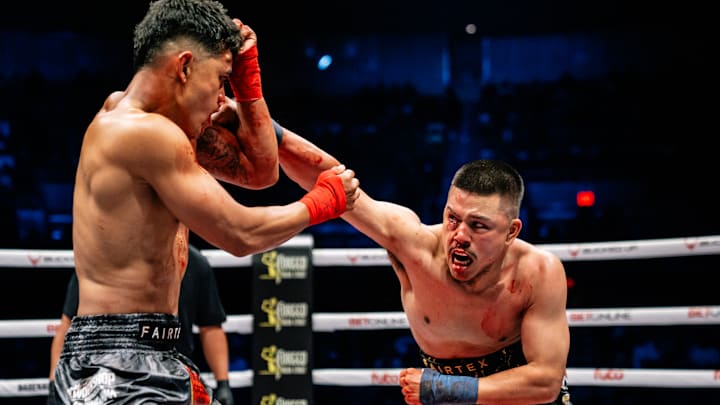 Nick Saragosa (right) throwing a punch at Kaylan Gorospe (left)