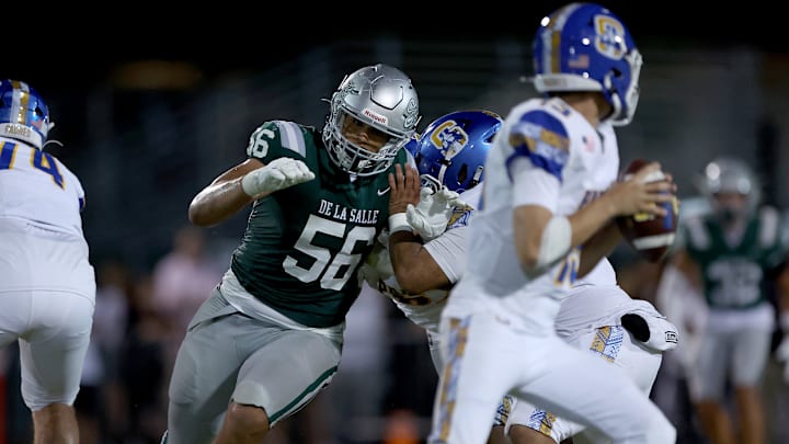 De La Salle 4-star defensive lineman and University of Oregon commit Matt Johnson (56) was a menace all night. He had a second-half sack in the Spartans' 39-10 win over Serra. On Wednesday, Johnson signed his letter of intent to the Ducks. 