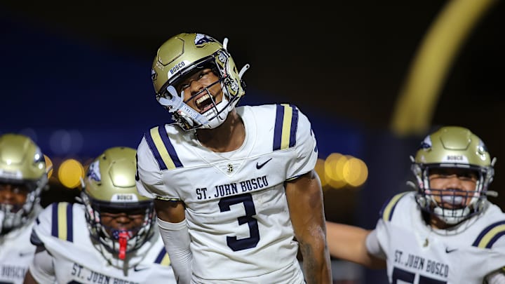 St. John Bosco (Calif.) receiver Daniel Odom shows emotion while taking the field with his teammates before facing Chaminade-Madonna in the season opener in Florida. 