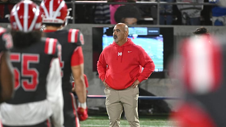 Mater Dei coach Raul Lara addresses team after resounding 59-14 win over St. John Bosco 10-25-24 at Santa Ana Stadium. 