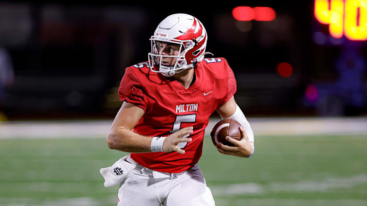 Milton senior quarterback Luke Nickel threw for 413 yards and four touchdowns in their state championship win against Langston Hughes Tuesday night. 