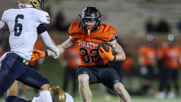 Platte County running back Adam Gisler carries against Helias in the Missouri Class 5 state title game.