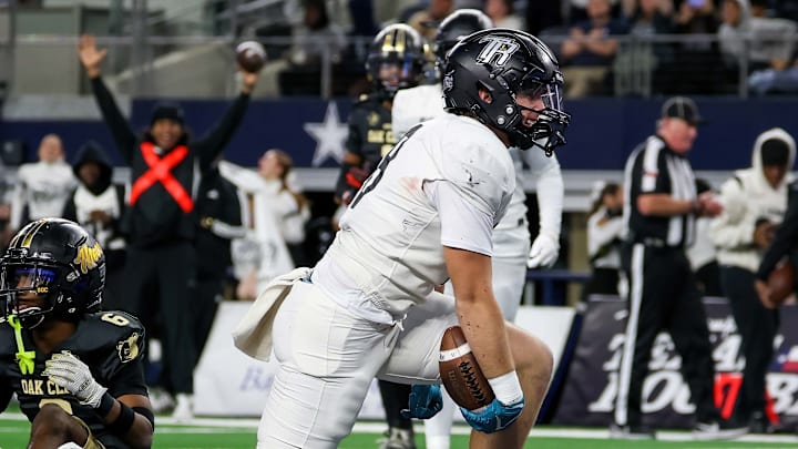 Richmond Randle tight end Mason Mixon celebrates scoring a touchdown during the first half of Texas 5A Division 1 title game at AT&T Stadium. Richmond Randle tight end Mason Mixon celebrates scoring a touchdown during the first half of Texas 5A Division 1 title game at AT&T Stadium.