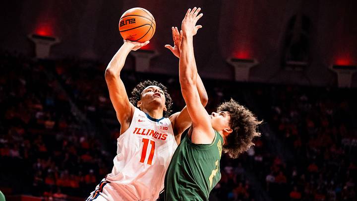 Illinois guard Quentin Coleman (11) drives to the hoop against a Baylor defender in the Illini's 95-91 loss to the Bears on Friday at the State Farm Center in Champaign, Illinois. Illinois guard Quentin Coleman (11) drives to the hoop against a Baylor defender in the Illini's 95-91 loss to the Bears on Friday at the State Farm Center in Champaign, Illinois.