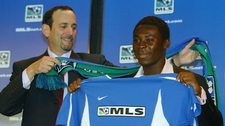 Don Garber (left) expressed regret about how MLS handled Freddy Adu’s (right) skills. 