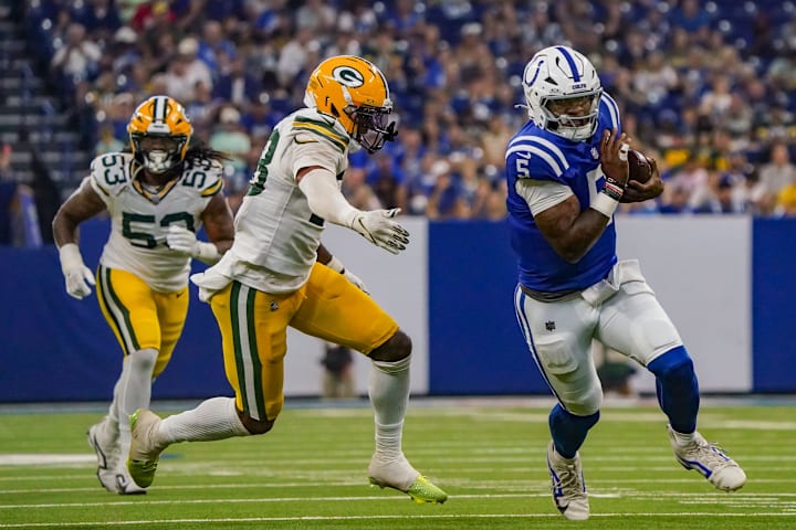 Indianapolis Colts quarterback Anthony Richardson Sr. (5) runs toward the end zone against the Packers in the 2025 preseason.