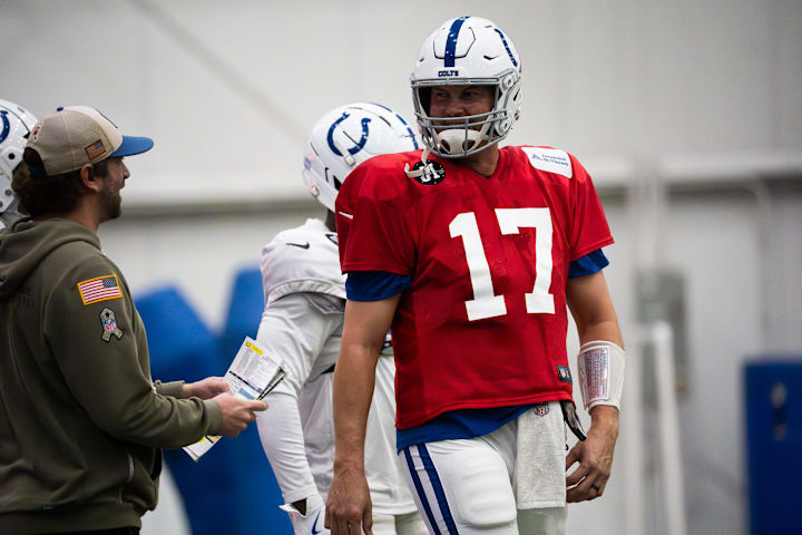 Indianapolis Colts quarterback Philip Rivers (17) talks with quarterbacks coach Cam Turner on Wednesday, Dec. 10, 2025, durin Indianapolis Colts quarterback Philip Rivers (17) talks with quarterbacks coach Cam Turner on Wednesday, Dec. 10, 2025, durin