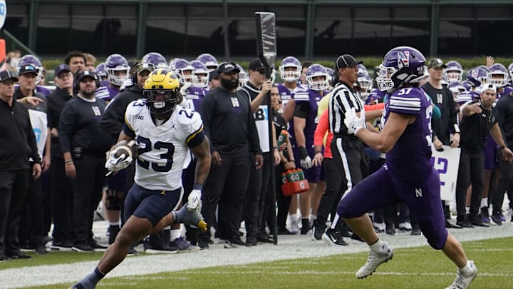 Nov 15, 2025; Chicago, Illinois, USA; Northwestern Wildcats linebacker Mac Uihlein (37) chases Michigan Wolverines running back Jordan Marshall (23) during the first half at Wrigley Field. Mandatory Credit: David Banks-Imagn Images Nov 15, 2025; Chicago, Illinois, USA; Northwestern Wildcats linebacker Mac Uihlein (37) chases Michigan Wolverines running back Jordan Marshall (23) during the first half at Wrigley Field. Mandatory Credit: David Banks-Imagn Images