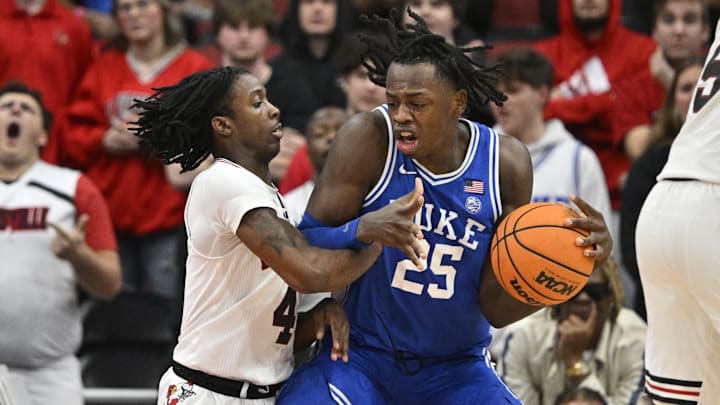 Jan 23, 2024; Louisville, Kentucky, USA;  Duke Blue Devils forward Mark Mitchell (25) posts up