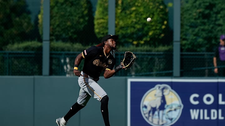 Aug 2, 2025; Denver, Colorado, USA; Pittsburgh Pirates center fielder Oneil Cruz (15) makes a catch for an out in the eighth inning against the Colorado Rockies at Coors Field. Mandatory Credit: Isaiah J. Downing-Imagn Images