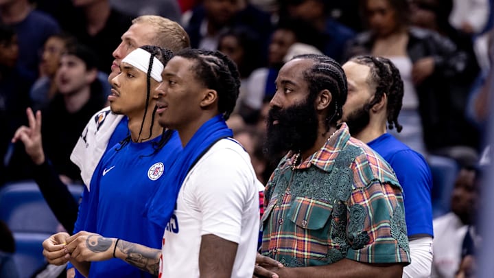 Mar 15, 2024; New Orleans, Louisiana, USA;  LA Clippers guard James Harden (1) watches the final minute from the bench against the New Orleans Pelicans during the second half at Smoothie King Center. Mandatory Credit: Stephen Lew-USA TODAY Sports