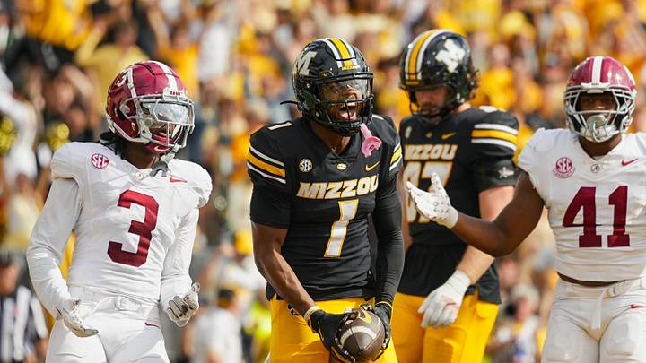 Oct 11, 2025; Columbia, Missouri, USA; Missouri Tigers wide receiver Donovan Olugbode (1) celebrates after scoring a touchdown during the second half against the Alabama Crimson Tide at Faurot Field at Memorial Stadium. Mandatory Credit: Jay Biggerstaff-Imagn Images Oct 11, 2025; Columbia, Missouri, USA; Missouri Tigers wide receiver Donovan Olugbode (1) celebrates after scoring a touchdown during the second half against the Alabama Crimson Tide at Faurot Field at Memorial Stadium. Mandatory Credit: Jay Biggerstaff-Imagn Images