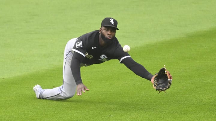 Jul 3, 2024; Cleveland, Ohio, USA; Chicago White Sox center fielder Luis Robert Jr. (88) makes a catch in the third inning against the Cleveland Guardians at Progressive Field. Mandatory Credit: David Richard-USA TODAY Sports