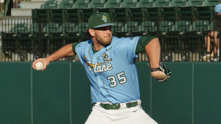 Tulane pitcher throws a baseball. Tulane pitcher throws a baseball.