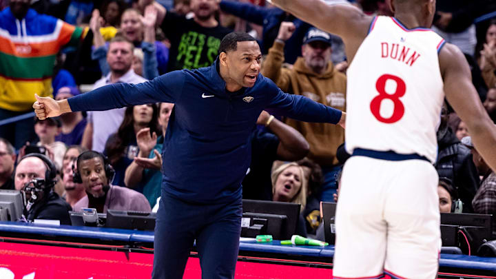 Dec 30, 2024; New Orleans, Louisiana, USA;  New Orleans head coach Willie Green reacts to a play against LA Clippers guard Kris Dunn (8) during the second half at Smoothie King Center. Mandatory Credit: Stephen Lew-Imagn Images