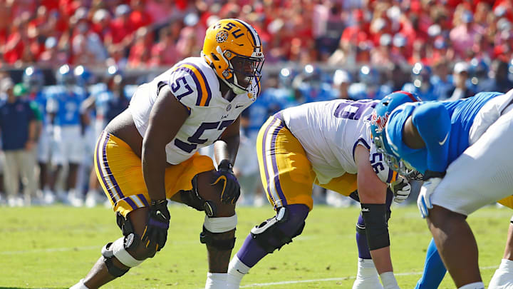 Sep 27, 2025; Oxford, Mississippi, USA; LSU Tigers offensive lineman Carius Curne (57) waits for the snap during the first quarter against the Mississippi Rebels at Vaught-Hemingway Stadium. Mandatory Credit: Petre Thomas-Imagn Images Sep 27, 2025; Oxford, Mississippi, USA; LSU Tigers offensive lineman Carius Curne (57) waits for the snap during the first quarter against the Mississippi Rebels at Vaught-Hemingway Stadium. Mandatory Credit: Petre Thomas-Imagn Images