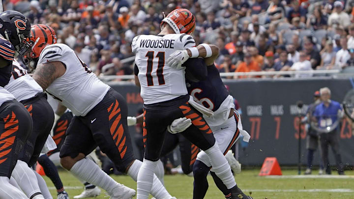 Aug 17, 2024; Chicago, Illinois, USA; Chicago Bears cornerback Kyler Gordon (6) sacks Cincinnati Bengals quarterback Logan Woodside (11) during the first half at Soldier Field. Mandatory Credit: David Banks-USA TODAY Sports