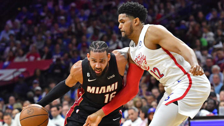 Apr 6, 2023; Philadelphia, Pennsylvania, USA; Miami Heat forward Caleb Martin (16) is defended by Philadelphia 76ers forward Tobias Harris (12) during the second quarter at Wells Fargo Center. Mandatory Credit: Eric Hartline-USA TODAY Sports